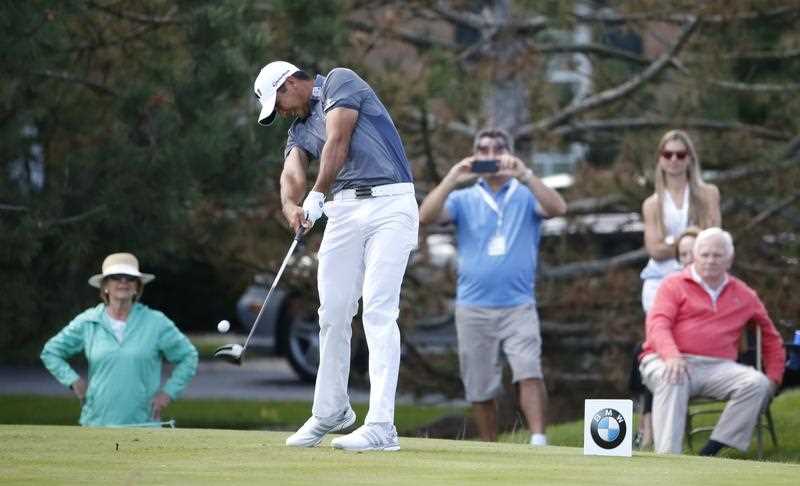 Jason Day, of Australia, hits his tee shot on the fourth hole during the final round of the BMW Championship golf tournament at Conway Farms Golf Club, Sunday, Sept. 20, 2015, in Lake Forest, Ill. Jason Day, of Australia, hits his tee shot on the fourth hole during the final round of the BMW Championship golf tournament at Conway Farms Golf Club, Sunday, Sept. 20, 2015, in Lake Forest, Ill.