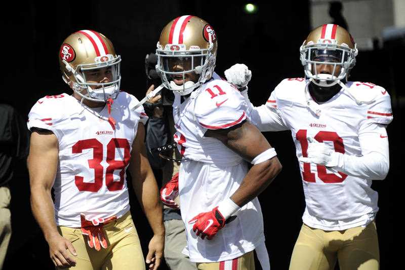 San Francisco 49ers running back Jarryd Hayne (38) wide receiver Quinton Patton (11) and wide receiver DeAndrew White (18) take the field forwarms up before an NFL football game against the Pittsburgh Steelers, Sunday, Sept. 20, 2015 in Pittsburgh. San Francisco 49ers running back Jarryd Hayne (38) wide receiver Quinton Patton (11) and wide receiver DeAndrew White (18) take the field forwarms up before an NFL football game against the Pittsburgh Steelers, Sunday, Sept. 20, 2015 in Pittsburgh.