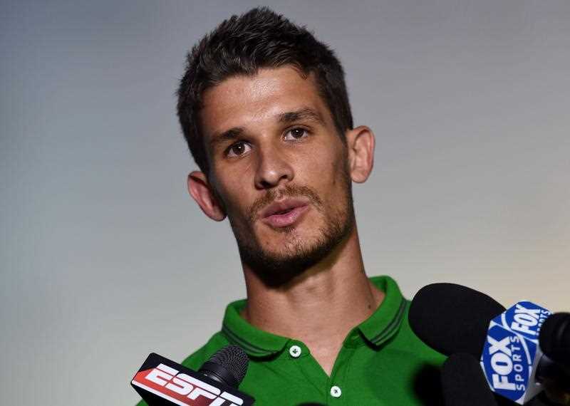 Australia's forward Dario Vidosic gives an interview after a press conference in Vitoria on June 10, 2014, as they prepare for the 2014 FIFA World Cup in Brazil. Australia's forward Dario Vidosic gives an interview after a press conference in Vitoria on June 10, 2014, as they prepare for the 2014 FIFA World Cup in Brazil.