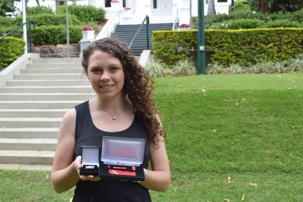Meghan Krogh accepted a bravery award on behalf of her father Peter Krogh. Mr Krogh helped save the life of a man caught in floodwater. Photo: Geoff Egan / APN Newsdesk Meghan Krogh accepted a bravery award on behalf of her father Peter Krogh. Mr Krogh helped save the life of a man caught in floodwater. Photo: Geoff Egan / APN Newsdesk