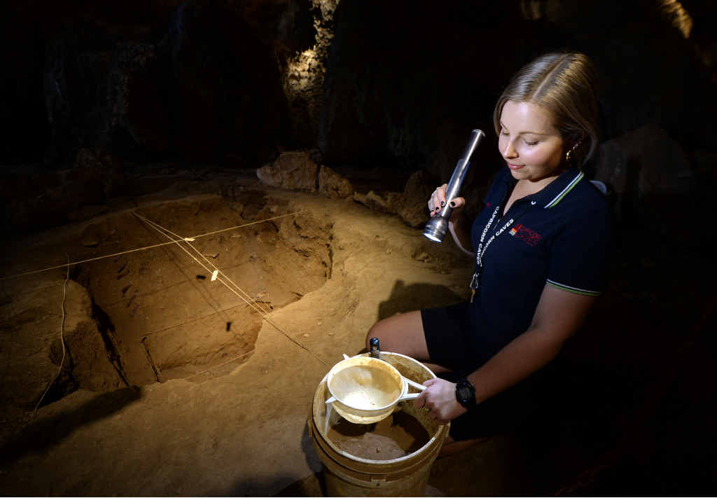 HISTORIC: Heidi Van Der Meer, from Capricorn Caves, at the dig site where the discovery of a small reptile bone has proved to be a historic find. HISTORIC: Heidi Van Der Meer, from Capricorn Caves, at the dig site where the discovery of a small reptile bone has proved to be a historic find.