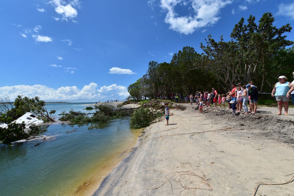 A large sink hole has swallowed a large chunk of the camping area on Inskip Point, taking with it a caravan, camper trailer and one vehicle. Photo: Che Chapman / Sunshine Coast Daily A large sink hole has swallowed a large chunk of the camping area on Inskip Point, taking with it a caravan, camper trailer and one vehicle. Photo: Che Chapman / Sunshine Coast Daily