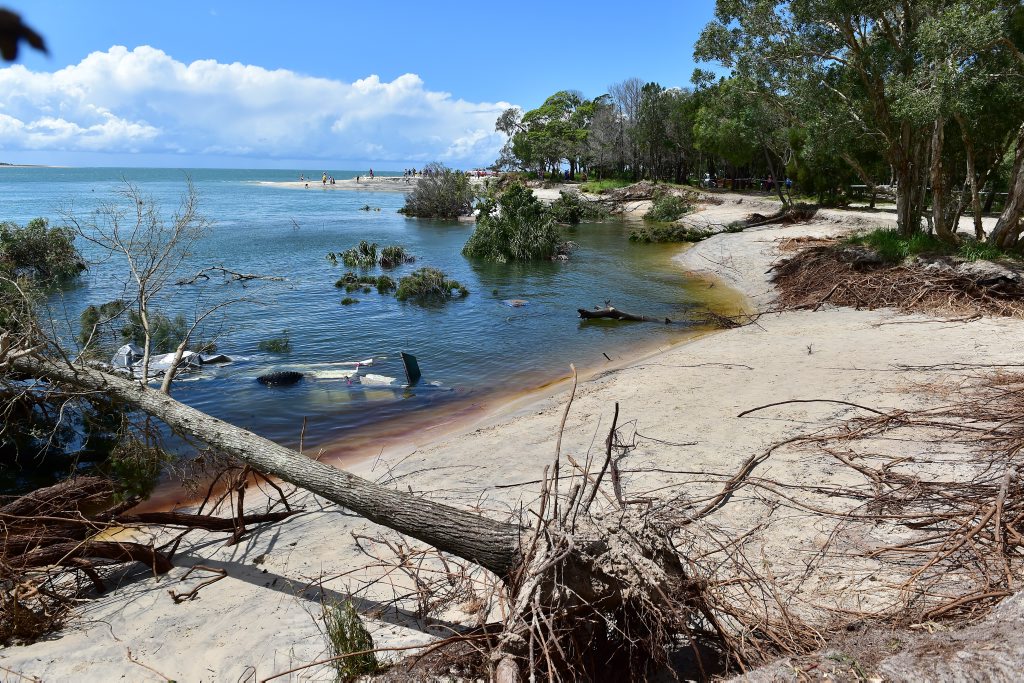 A large sink hole has swallowed a large chunk of the camping area on Inskip Point, taking with it a caravan, camper trailer and one vehicle. Photo: Che Chapman / Sunshine Coast Daily A large sink hole has swallowed a large chunk of the camping area on Inskip Point, taking with it a caravan, camper trailer and one vehicle. Photo: Che Chapman / Sunshine Coast Daily