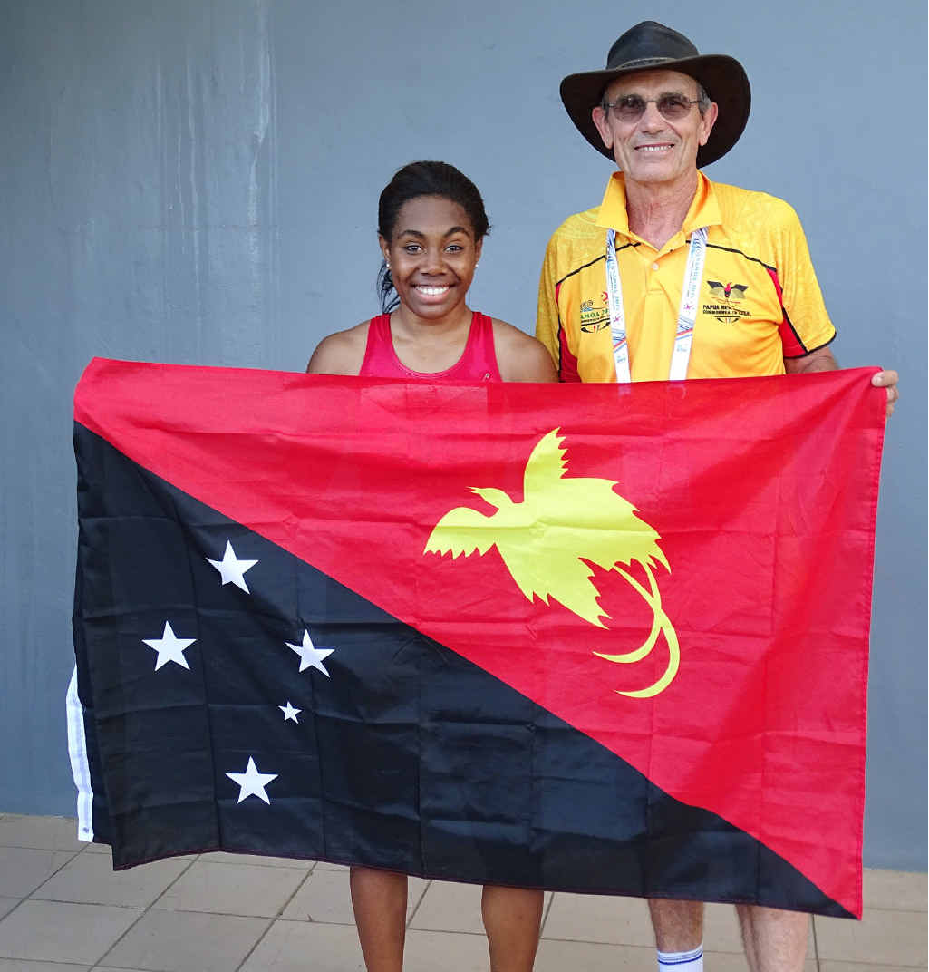 FLAGGING SUCCESS: Ipswich sprinter Miriam Peni, representing PNG, with her coach Vic Pascoe at the Commonwealth Youth Games. FLAGGING SUCCESS: Ipswich sprinter Miriam Peni, representing PNG, with her coach Vic Pascoe at the Commonwealth Youth Games.