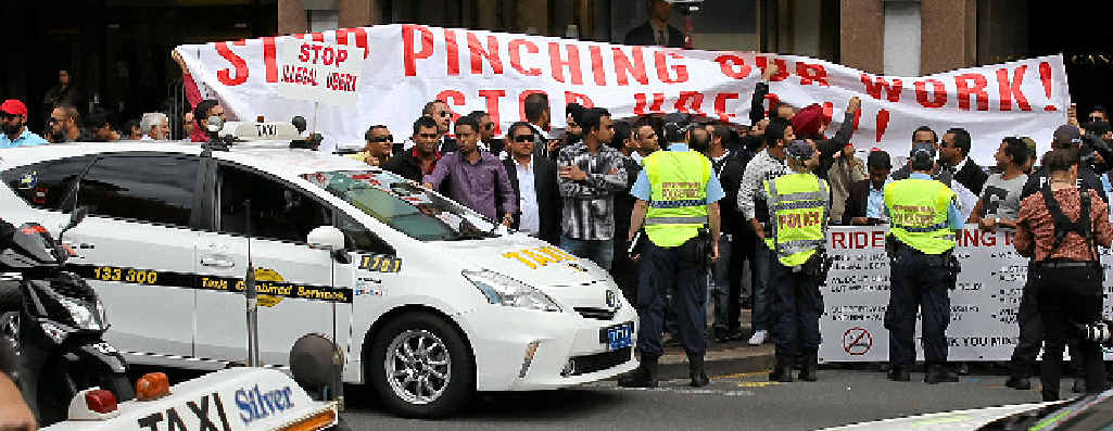 ANGRY: Taxi drivers protest against Uber in Macquarie St, Sydney, earlier this month. ANGRY: Taxi drivers protest against Uber in Macquarie St, Sydney, earlier this month.