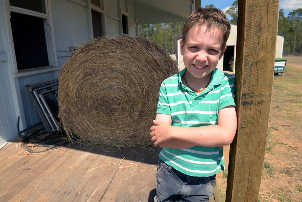 BALED UP: Wal and Michelle Verdel's grandson Ari Hollands hopes that someone can help transport 150 bales of hay to drought stricken farmers in Longreach. Photo: Max Fleet / NewsMail BALED UP: Wal and Michelle Verdel's grandson Ari Hollands hopes that someone can help transport 150 bales of hay to drought stricken farmers in Longreach. Photo: Max Fleet / NewsMail