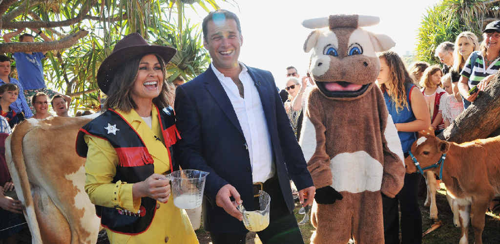 RIGHT MOOVES: Channel Nine Today Show presenters Lisa Wilkinson and Karl Stefanovic have some fun after a milking competition as part of the show broadcast from Moffat Beach. RIGHT MOOVES: Channel Nine Today Show presenters Lisa Wilkinson and Karl Stefanovic have some fun after a milking competition as part of the show broadcast from Moffat Beach.
