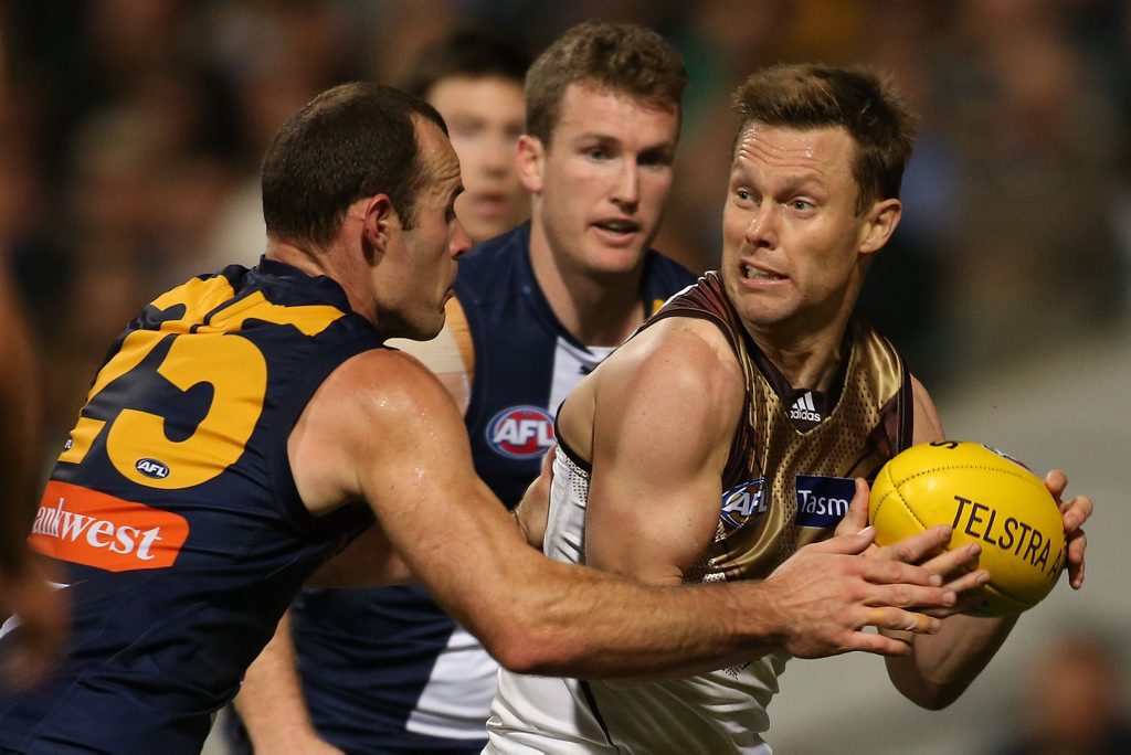PERTH, AUSTRALIA - SEPTEMBER 11: Sam Mitchell of the Hawks looks to pass the ball during the AFL Qualifying Final match between the West Coast Eagles and Hawthorn Hawks at Domain Stadium on September 11, 2015 in Perth, Australia. (Photo by Paul Kane/Getty Images) PERTH, AUSTRALIA - SEPTEMBER 11: Sam Mitchell of the Hawks looks to pass the ball during the AFL Qualifying Final match between the West Coast Eagles and Hawthorn Hawks at Domain Stadium on September 11, 2015 in Perth, Australia. (Photo by Paul Kane/Getty Images)