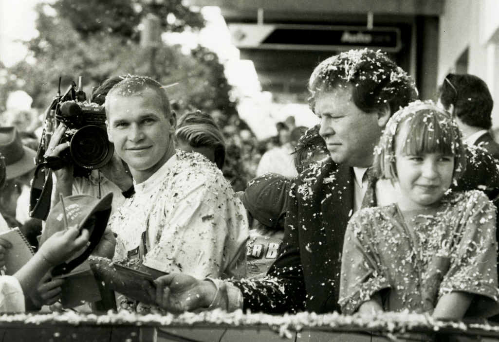 Allan Langer is showered with ticker tape as he parades through Ipswich with the Brisbane Broncos after winning the 1992 Winfield Cup premiership. 