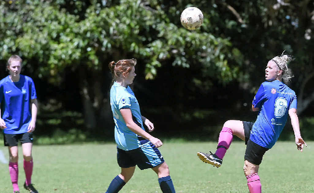 Chloe Dunsmore, right, gets boot to ball for Bangalow. Chloe Dunsmore, right, gets boot to ball for Bangalow.