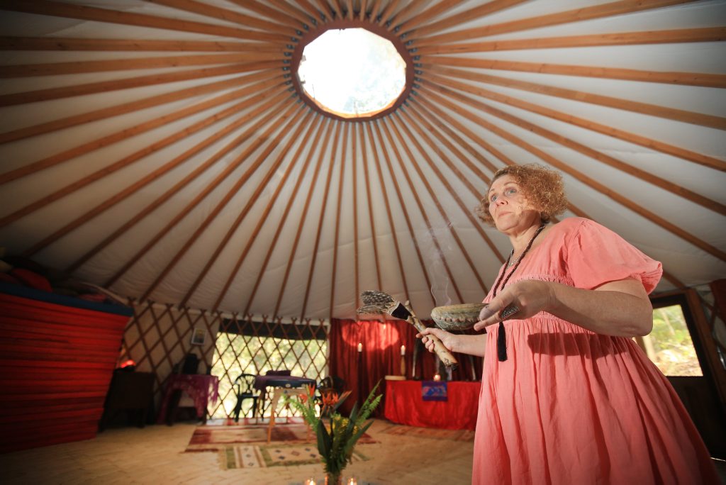 Sexologist and “priestess of Goddess”, Kerri Ryan, in her temple at Uki. Sexologist and “priestess of Goddess”, Kerri Ryan, in her temple at Uki.