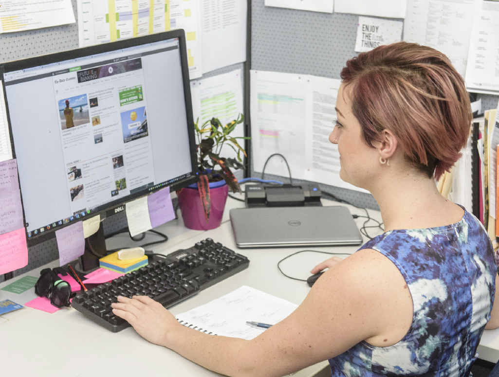 Daily Examiner deputy editor and digital producer Georja Ryan checks the changes on The Daily Examiner website. Photo Adam Hourigan