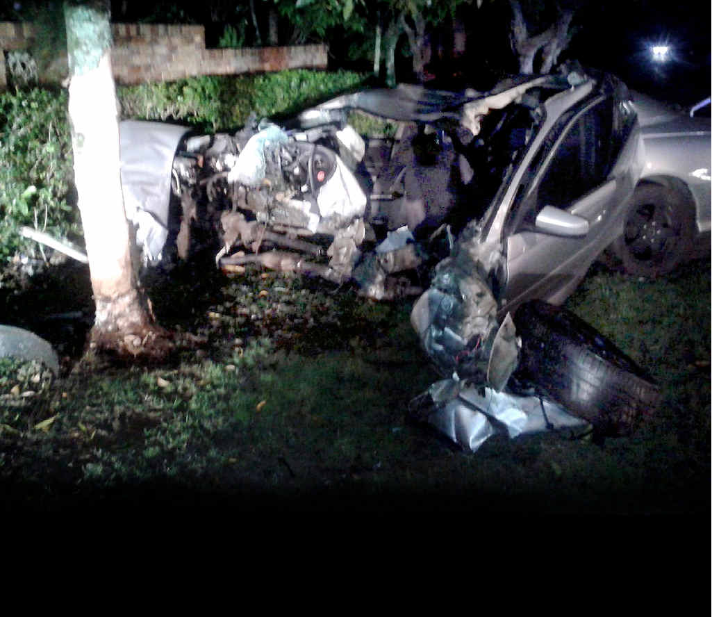 RUNAWAY DRIVER: The remains of a car that hit a tree on Ballina Rd on Saturday night. The driver fled the scene. RUNAWAY DRIVER: The remains of a car that hit a tree on Ballina Rd on Saturday night. The driver fled the scene.