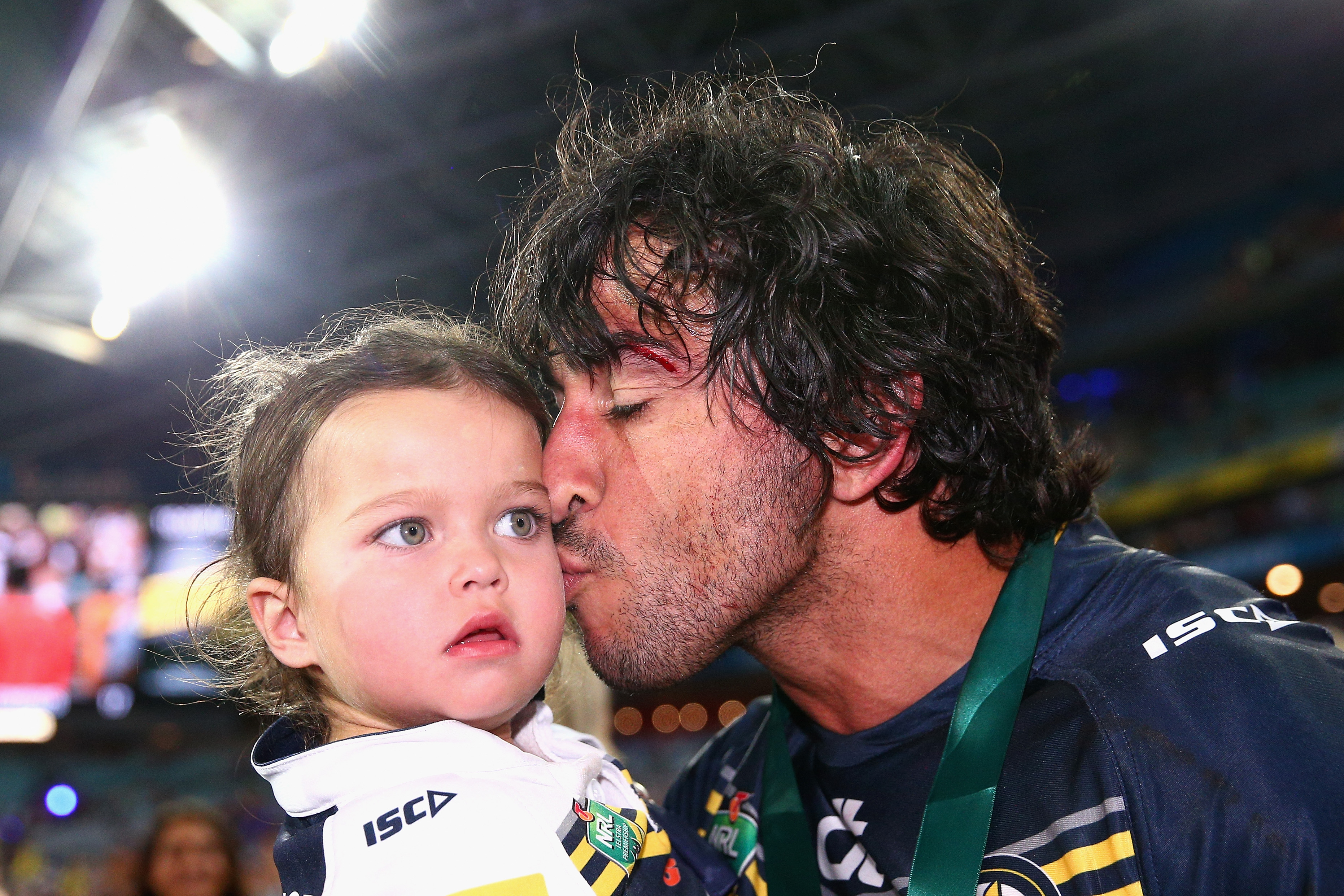 Victorious North Queensland Cowboys co-captain Johnathan Thurston with daughter Frankie. Victorious North Queensland Cowboys co-captain Johnathan Thurston with daughter Frankie.