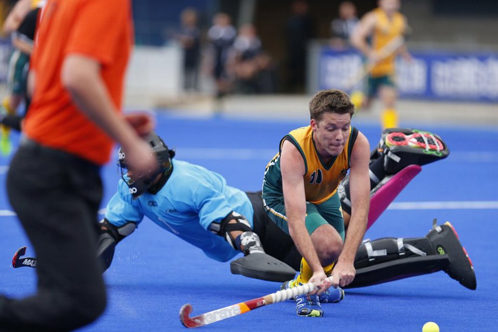 GREEN AND GOLD: Bundaberg's Scott Whitaker at the Trans-Tasman Masters event in Melbourne in May 2015 shooting under pressure. Photo Alan Delaney GREEN AND GOLD: Bundaberg's Scott Whitaker at the Trans-Tasman Masters event in Melbourne in May 2015 shooting under pressure. Photo Alan Delaney