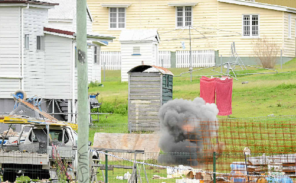 BOMB SEARCH: Police safely detonate explosive materials found at the West Ipswich home of Glen Charles Dell and Mark Anthony Tear following a search of the property in July, 2013. BOMB SEARCH: Police safely detonate explosive materials found at the West Ipswich home of Glen Charles Dell and Mark Anthony Tear following a search of the property in July, 2013.