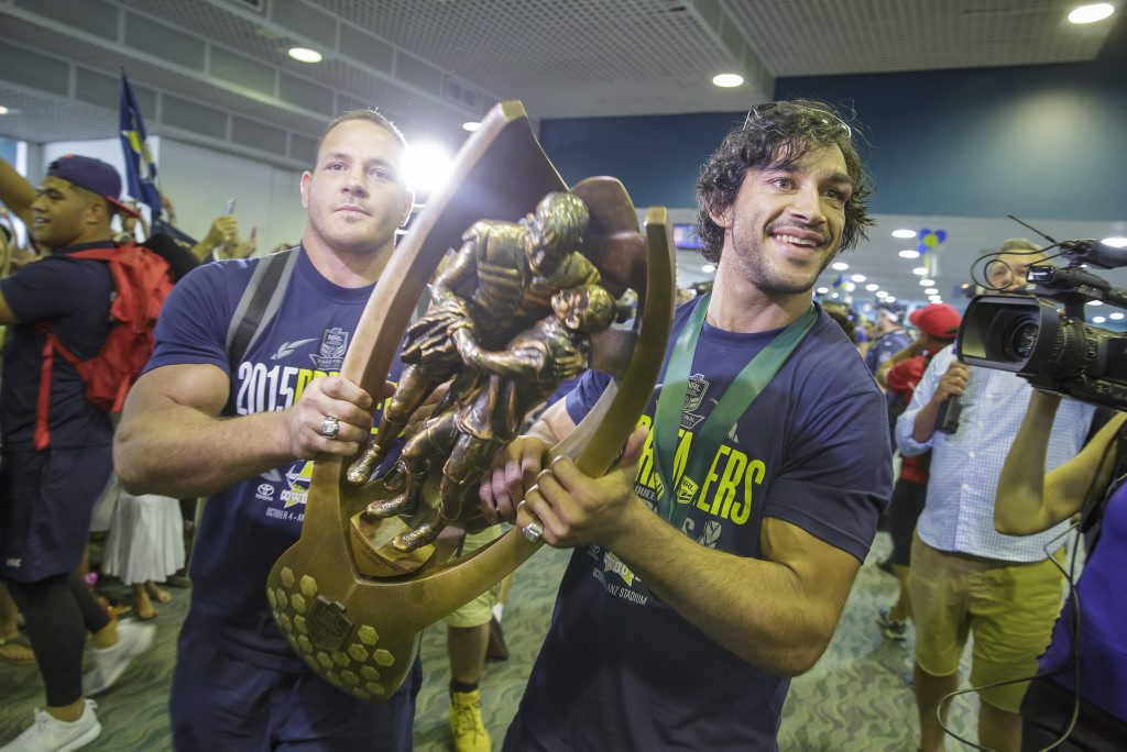 North Queensland Cowboys co-captain Matthew Scott and Johnathan Thurston hold the grand final trophy at Townsville Airport, Monday, Oct. 5, 2015. The Cowboys beat the Brisbane Broncos in the NRL Grand Final. North Queensland Cowboys co-captain Matthew Scott and Johnathan Thurston hold the grand final trophy at Townsville Airport, Monday, Oct. 5, 2015. The Cowboys beat the Brisbane Broncos in the NRL Grand Final.