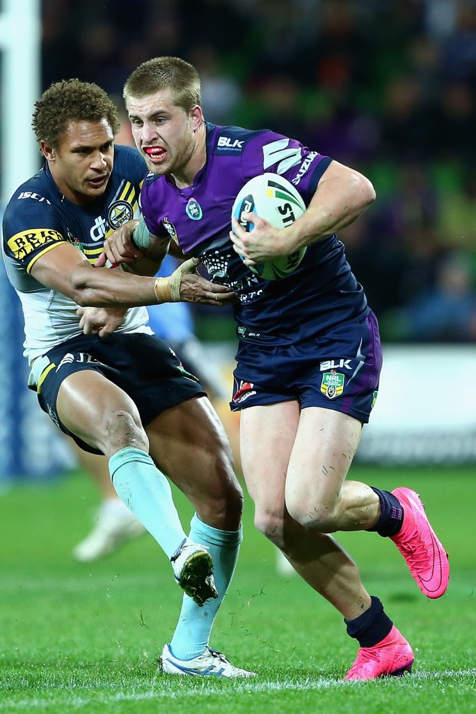 MELBOURNE, AUSTRALIA - AUGUST 29: Cameron Munster of the Storm is tackled during the round 25 NRL match between the Melbourne Storm and the North Queensland Cowboys at AAMI Park on August 29, 2015 in Melbourne, Australia. (Photo by Robert Prezioso/Getty Images) MELBOURNE, AUSTRALIA - AUGUST 29: Cameron Munster of the Storm is tackled during the round 25 NRL match between the Melbourne Storm and the North Queensland Cowboys at AAMI Park on August 29, 2015 in Melbourne, Australia. (Photo by Robert Prezioso/Getty Images)