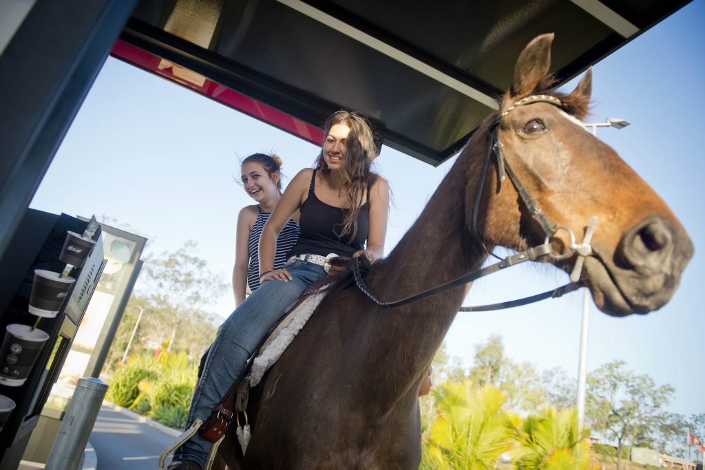READY TO ORDER: Andrea Cheslin and Miffany Bolts take Chance through drive-thru. READY TO ORDER: Andrea Cheslin and Miffany Bolts take Chance through drive-thru.