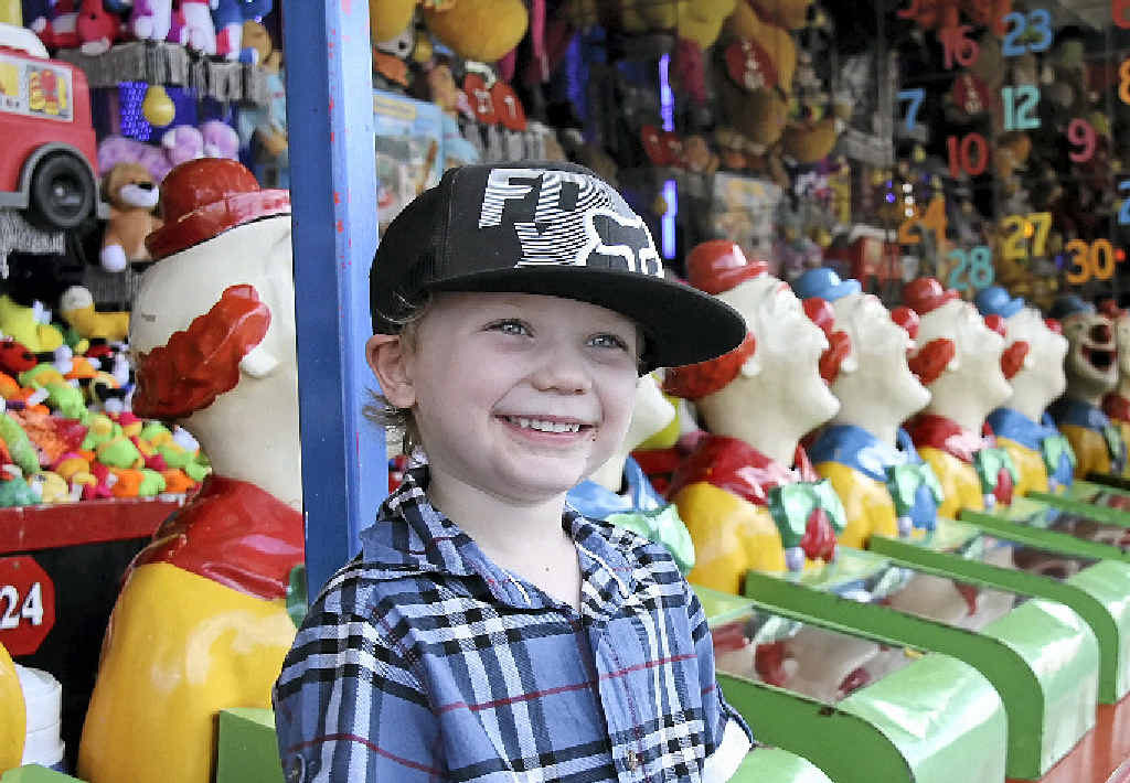 WINNERS ARE GRINNERS: Cooper Hyde, 4, is all smiles after winning a prize on the clowns at the Kyogle Show. WINNERS ARE GRINNERS: Cooper Hyde, 4, is all smiles after winning a prize on the clowns at the Kyogle Show.