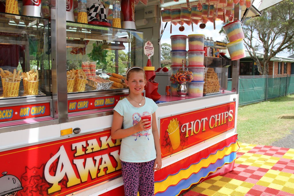 Lilly Feakes, 11, of Kyogle, enjoying a raspberry slushie at the 2015 Kyogle Show. Lilly Feakes, 11, of Kyogle, enjoying a raspberry slushie at the 2015 Kyogle Show.