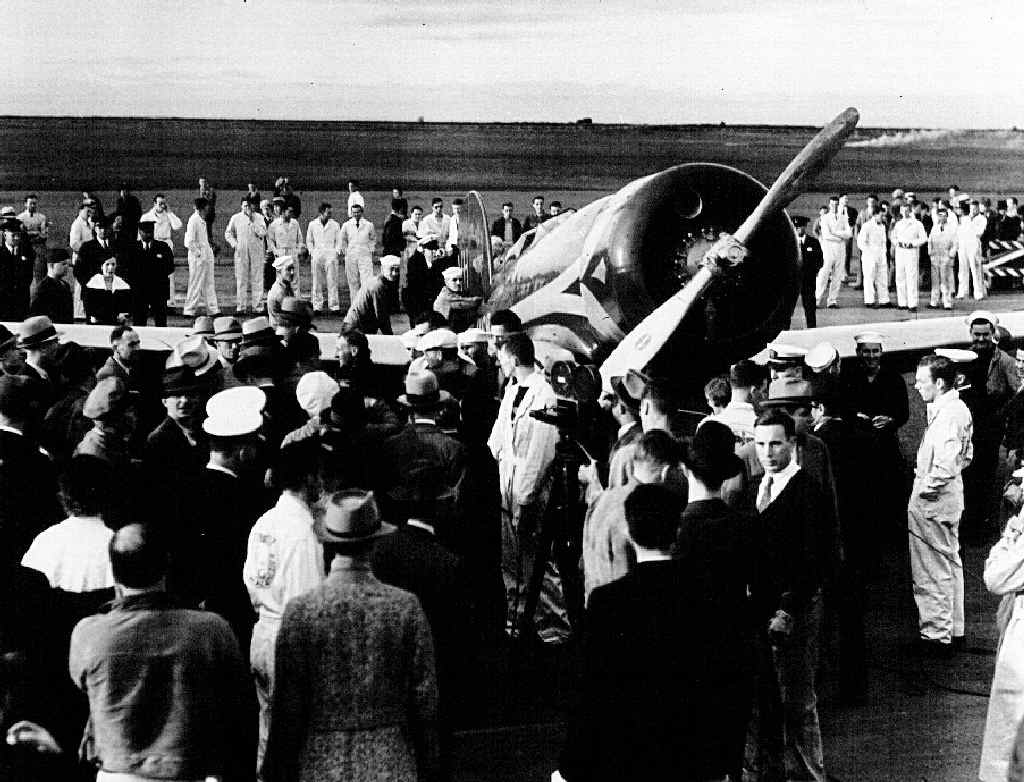 Patrick Gordon ‘Bill’ Taylor and Sir Charles Kingsford-Smith are swamped by the crowd after arriving in America. Patrick Gordon ‘Bill’ Taylor and Sir Charles Kingsford-Smith are swamped by the crowd after arriving in America.
