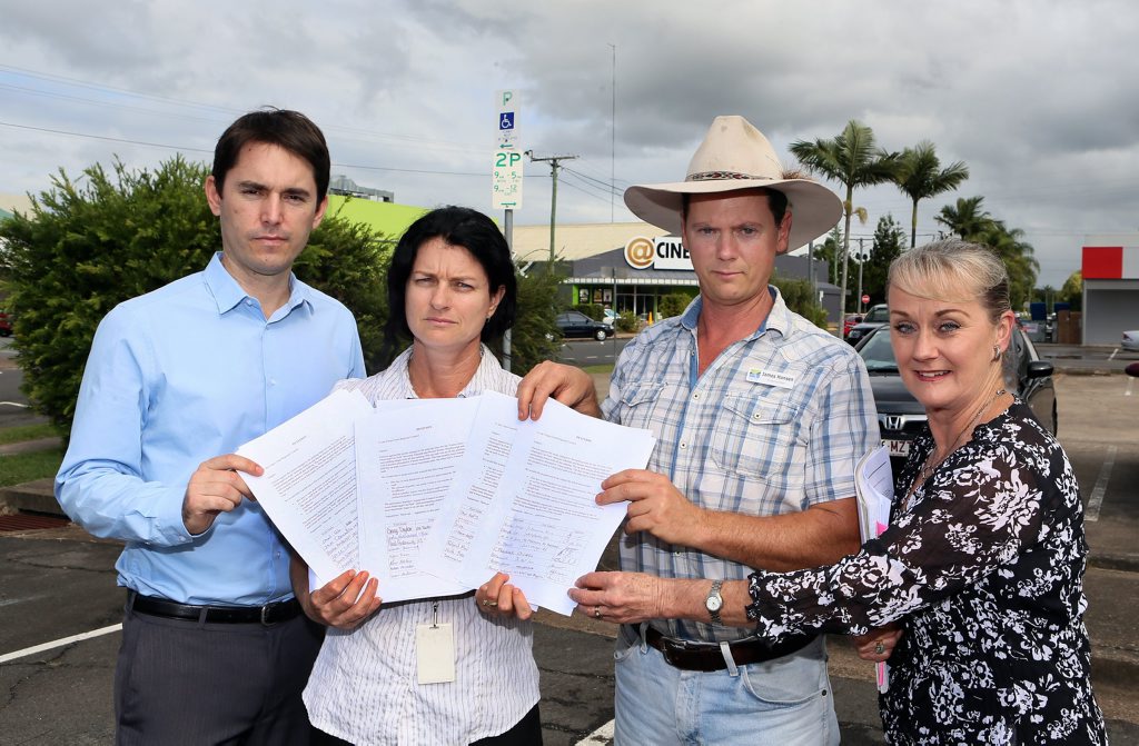Councillor George Seymour (left), Councillor James Hansen and Ergon employees, Maria Fuchs and Denise Young holding a petition against the new timed parking in Maryborough car parks. Photo: Brendan Bufi / Fraser Coast Chronicle Councillor George Seymour (left), Councillor James Hansen and Ergon employees, Maria Fuchs and Denise Young holding a petition against the new timed parking in Maryborough car parks. Photo: Brendan Bufi / Fraser Coast Chronicle