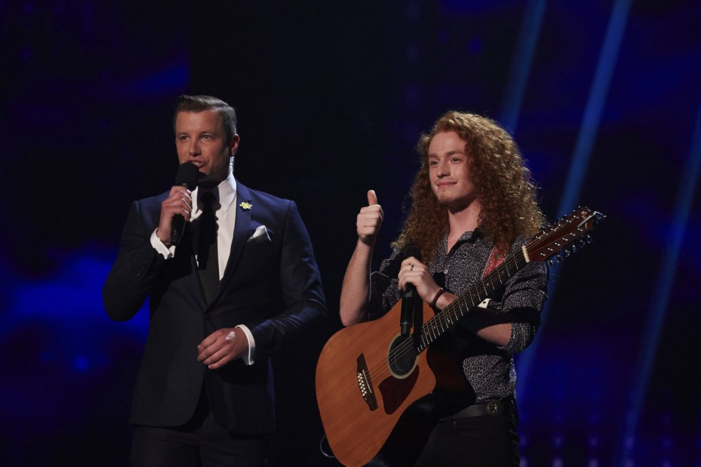Jimmy Davis pictured with The X Factor host Luke Jacobz after his performance of The Killers song When You Were Young. Jimmy Davis pictured with The X Factor host Luke Jacobz after his performance of The Killers song When You Were Young.