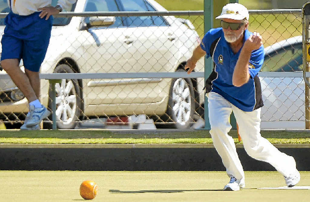 IN ACTION: Andy Caisley sends one down the green. IN ACTION: Andy Caisley sends one down the green.