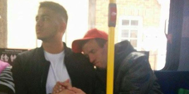 Godfrey Coutto comforts Robert during the bus ride. Godfrey Coutto comforts Robert during the bus ride.