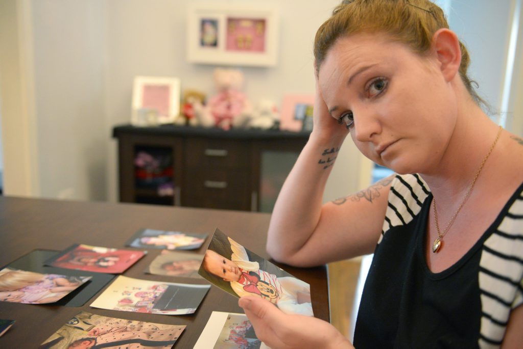 NOT FAIR: Danieka McLaren had her daughter's hands and feet prints framed by a company in Bundaberg to remember her four-month-old daughter Willow who passed away in July. Now the company says they want more money from her because the charge is extra for someone who has passed away. Photo: Max Fleet / NewsMail NOT FAIR: Danieka McLaren had her daughter's hands and feet prints framed by a company in Bundaberg to remember her four-month-old daughter Willow who passed away in July. Now the company says they want more money from her because the charge is extra for someone who has passed away. Photo: Max Fleet / NewsMail