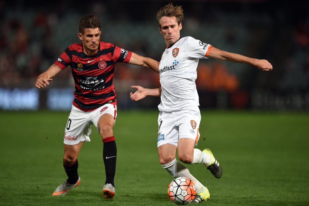 Corona (right) of the Roar is tackled by Dario Vidosic of the Wanderers during the round 1 A-League match between the Western Sydney Wanderers and the Brisbane Roar at Pirtek Stadium in Sydney on Thursday, Oct. 8, 2015. (AAP Image/Paul Miller) NO ARCHIVING, EDITORIAL USE ONLY Corona (right) of the Roar is tackled by Dario Vidosic of the Wanderers during the round 1 A-League match between the Western Sydney Wanderers and the Brisbane Roar at Pirtek Stadium in Sydney on Thursday, Oct. 8, 2015. (AAP Image/Paul Miller) NO ARCHIVING, EDITORIAL USE ONLY
