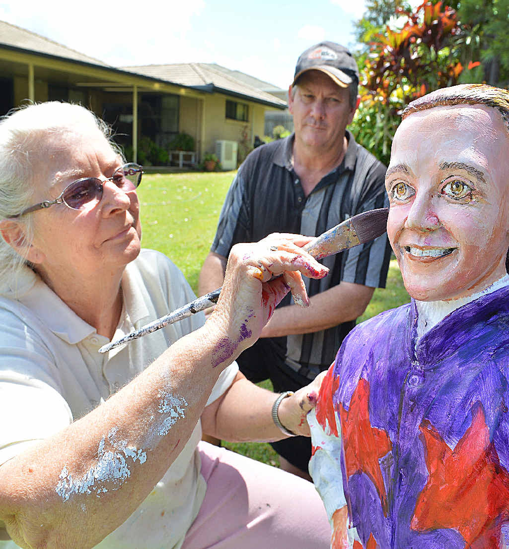 FINISHING TOUCHES: Watched by sculptor Dan Davie, artist Julie Bambling applies the colour to Mr Davie’s tribute to Rockhampton jockey, the late Carly-Mae Pye. FINISHING TOUCHES: Watched by sculptor Dan Davie, artist Julie Bambling applies the colour to Mr Davie’s tribute to Rockhampton jockey, the late Carly-Mae Pye.