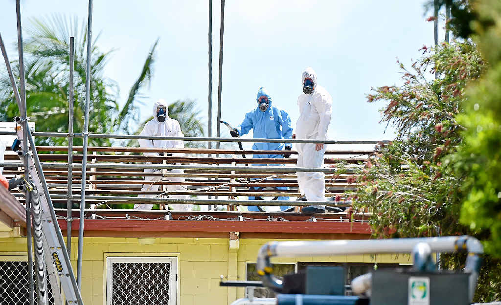SUITED-UP: Asbestos being removed from a property on Main Road at Maroochydore. SUITED-UP: Asbestos being removed from a property on Main Road at Maroochydore.