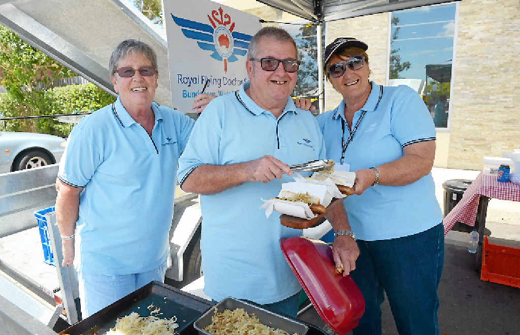 DOLLARS FOR THE DOCTORS: RFDS Auxiliary president Carolyn Saffron, Rod Dwyer and Barb Small raise money by holding a barbecue outside Dan Murphy’s once a fortnight. DOLLARS FOR THE DOCTORS: RFDS Auxiliary president Carolyn Saffron, Rod Dwyer and Barb Small raise money by holding a barbecue outside Dan Murphy’s once a fortnight.