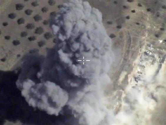 An image taken from footage released by the Russian Air Force on Monday showing an airstrike in Latakia Province, Syria. An image taken from footage released by the Russian Air Force on Monday showing an airstrike in Latakia Province, Syria.
