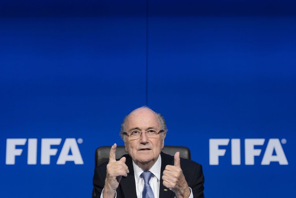 (FILES) A file picture taken on July 20, 2015, shows FIFA president Sepp Blatter gesturing during a press conference at the football's world body headquarter's in Zurich. The ethics watchdog of scandal-tainted FIFA was locked in talks on October 7, 2015, to decide the fate of world football president Sepp Blatter as attacks on the veteran sports baron mounted. AFP PHOTO / FABRICE COFFRINI (FILES) A file picture taken on July 20, 2015, shows FIFA president Sepp Blatter gesturing during a press conference at the football's world body headquarter's in Zurich. The ethics watchdog of scandal-tainted FIFA was locked in talks on October 7, 2015, to decide the fate of world football president Sepp Blatter as attacks on the veteran sports baron mounted. AFP PHOTO / FABRICE COFFRINI