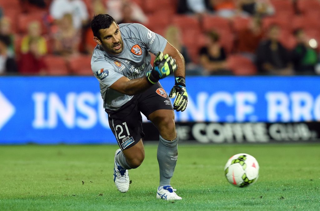 Gloves are on ... Roar goal keeper Jamie Young dispenses the ball during a game last season. Photo: Dave Hunt/AAP Images. Gloves are on ... Roar goal keeper Jamie Young dispenses the ball during a game last season. Photo: Dave Hunt/AAP Images.