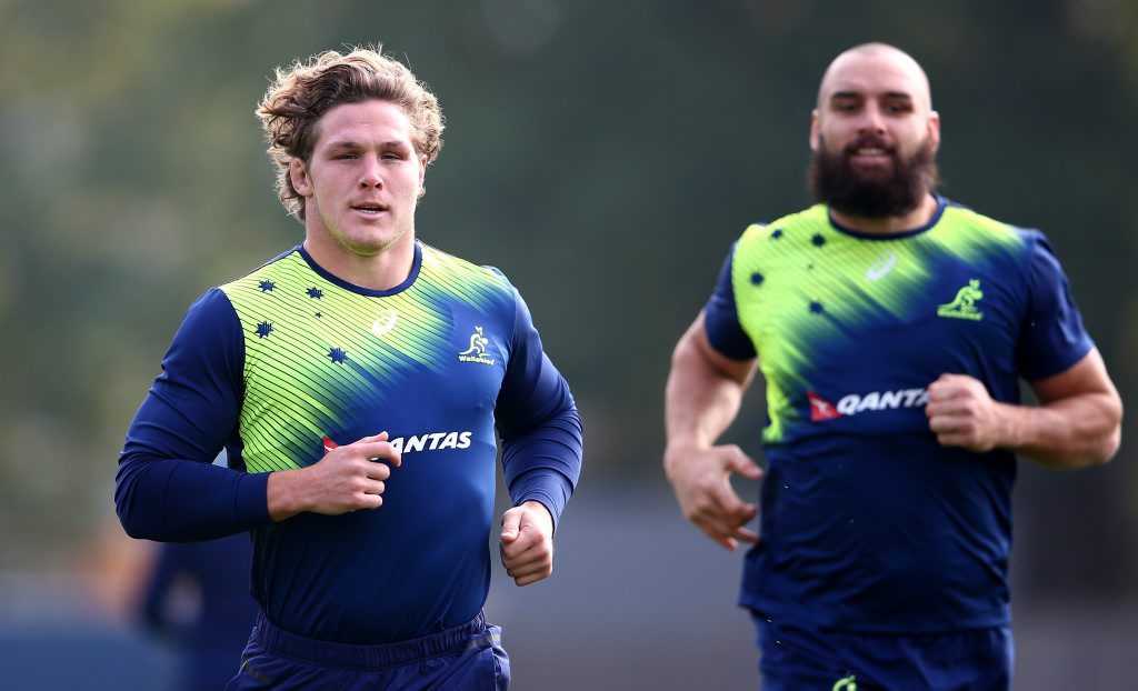 Ready to go ... Michael Hooper and Scott Fardy warm up during a Wallabies training session at The Lensbury Hotel in London. Photo: Dan Mullan/Getty Images. Ready to go ... Michael Hooper and Scott Fardy warm up during a Wallabies training session at The Lensbury Hotel in London. Photo: Dan Mullan/Getty Images.