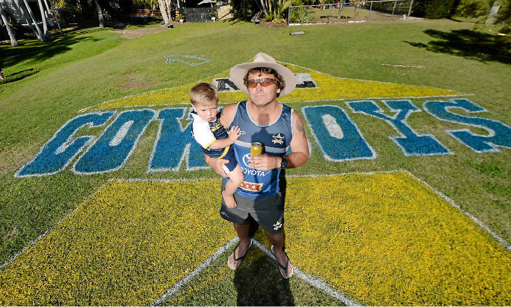 COWABUNGA: Cowboys supporter Leslie Horstman decorated the nature strip outside his home for the grand final weekend. COWABUNGA: Cowboys supporter Leslie Horstman decorated the nature strip outside his home for the grand final weekend.
