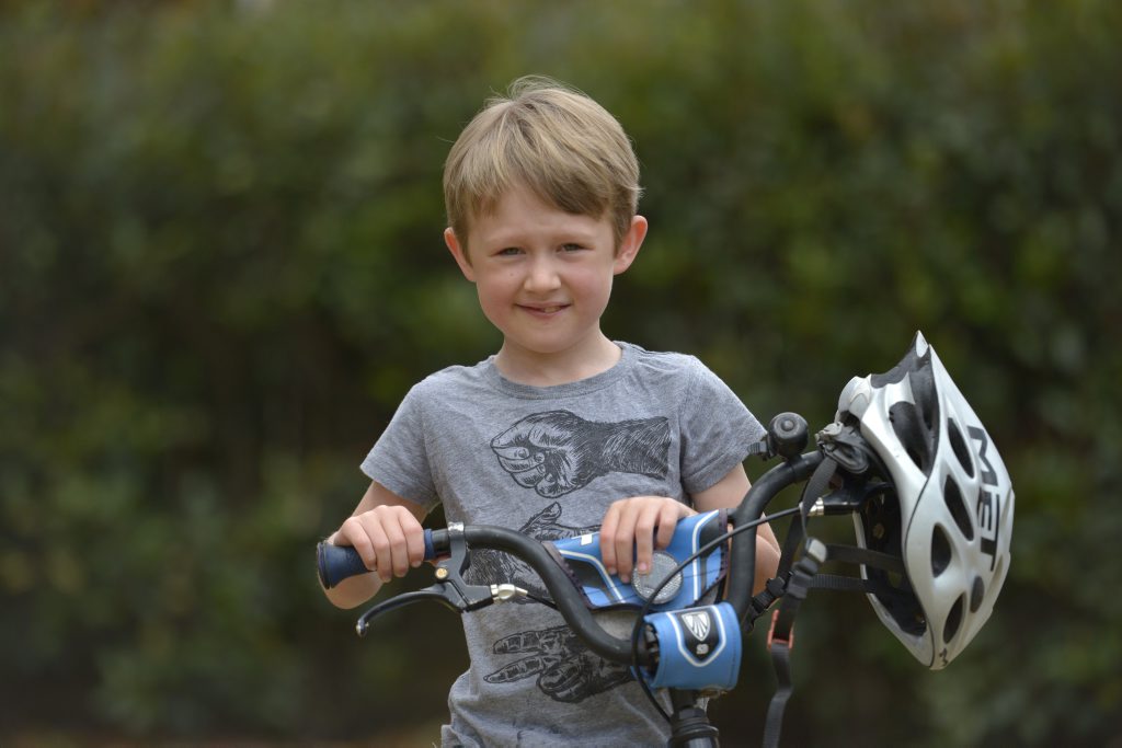 FAVOURITE THINGS: Riding his bike is one of seven-year-old Max Bennett's past times. He is home with his family after spending time in hospital with a rare neurological disorder. Photo Bev Lacey / The Chronicle FAVOURITE THINGS: Riding his bike is one of seven-year-old Max Bennett's past times. He is home with his family after spending time in hospital with a rare neurological disorder. Photo Bev Lacey / The Chronicle
