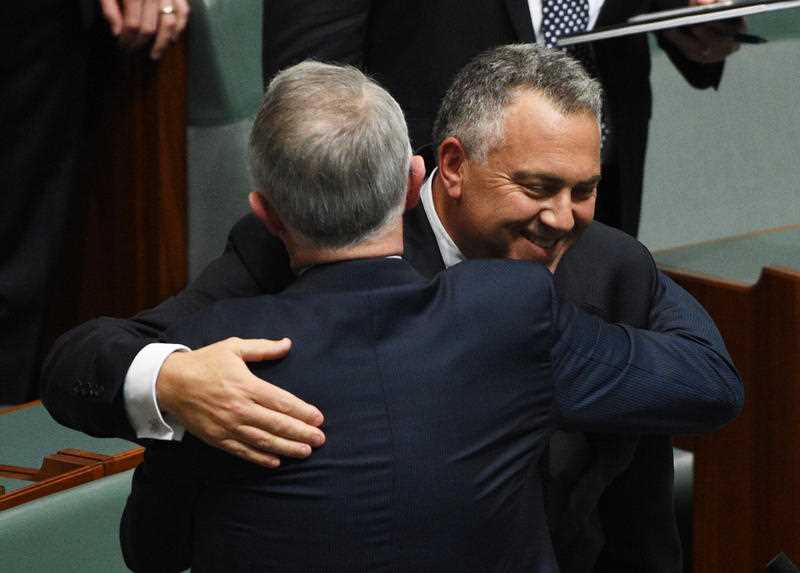 Former treasurer Joe Hockey hugs Prime Minister Malcolm Turnbull after making his valedictory speech in the House of Representatives at Parliament House in Canberra on Wednesday, Oct. 21, 2015. Former treasurer Joe Hockey hugs Prime Minister Malcolm Turnbull after making his valedictory speech in the House of Representatives at Parliament House in Canberra on Wednesday, Oct. 21, 2015.