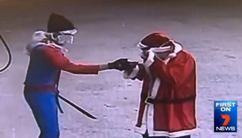'Santa' and 'Spiderman' rob the Lockyer Valley service station. 'Santa' and 'Spiderman' rob the Lockyer Valley service station.