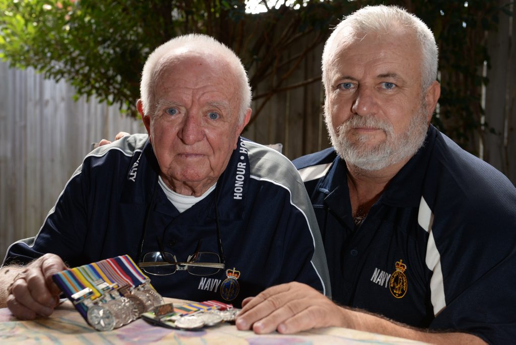 PROUD PAIR: Father and son, Noel and Max Francis, had their portrait taken as part of the 1/100 exhibition. Photo: Mike Knott / NewsMail PROUD PAIR: Father and son, Noel and Max Francis, had their portrait taken as part of the 1/100 exhibition. Photo: Mike Knott / NewsMail