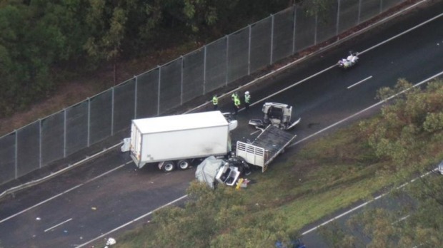 A two-truck crash blocks the westbound lanes on the Warrego Highway near North Ipswich. Photo by Penny Dahl/Brisbane Times. A two-truck crash blocks the westbound lanes on the Warrego Highway near North Ipswich. Photo by Penny Dahl/Brisbane Times.