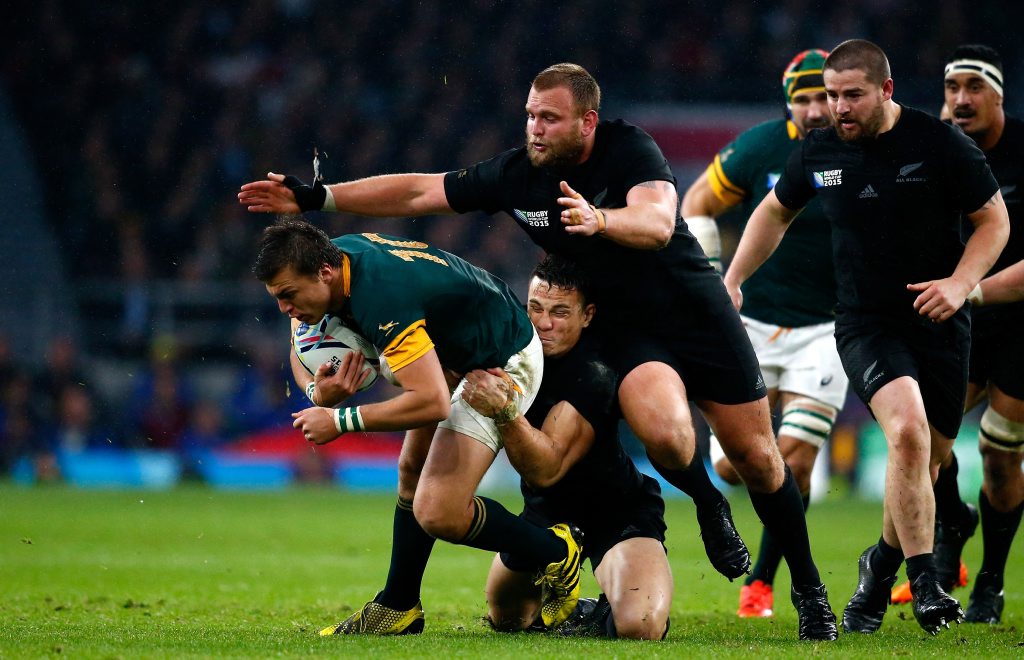 In the thick of it ... Handre Pollard, of South Africa, is tackled by All Blacks Sonny Bill Williams and Joe Moody during the semi-final at Twickenham. Photo: Laurence Griffiths/Getty Images. In the thick of it ... Handre Pollard, of South Africa, is tackled by All Blacks Sonny Bill Williams and Joe Moody during the semi-final at Twickenham. Photo: Laurence Griffiths/Getty Images.
