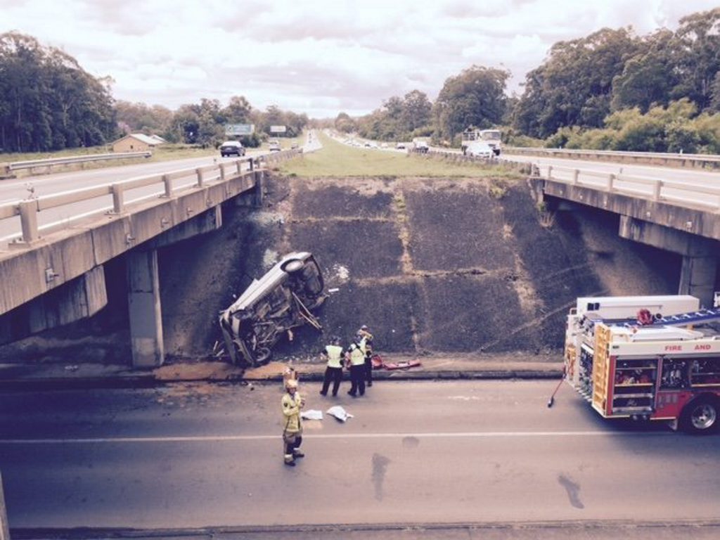 The vehicle came to rest on its side below the Bruce Hwy at Palmview. The vehicle came to rest on its side below the Bruce Hwy at Palmview.