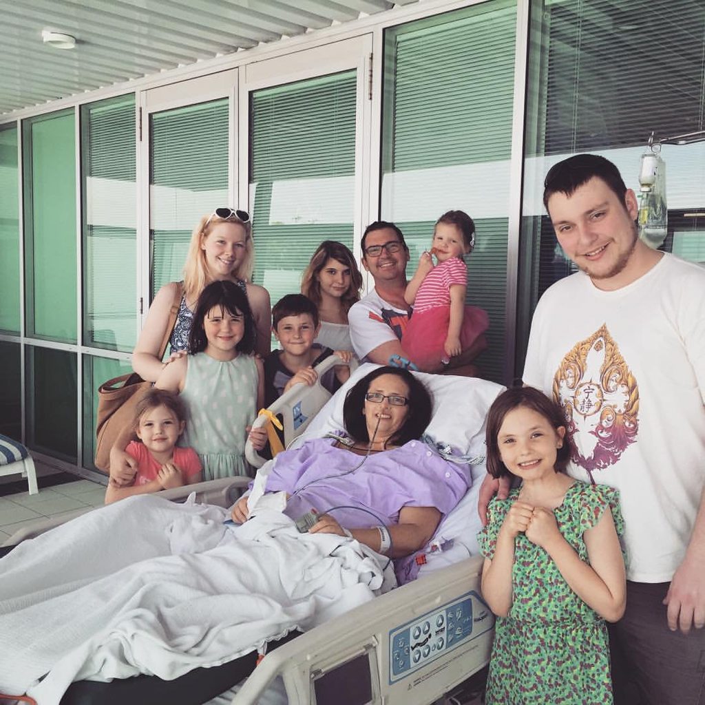 The large Devereaux clan enjoys a beautiful moment together with recovering mum Tracey, on the balcony of ICU at the Royal Brisbane Hospital on the weekend. The large Devereaux clan enjoys a beautiful moment together with recovering mum Tracey, on the balcony of ICU at the Royal Brisbane Hospital on the weekend.