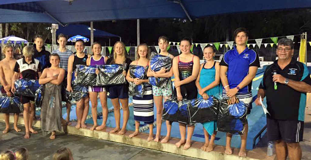 MAKING A SPLASH: Emu Park Swimming Club members Ethan Murphy, William Garraway, Patrick Doherty, Isabelle Paskin, Caitlyn Goudie, Caitlyn Emery, Jessica Delugar, Emma Burgess, Imogen Brosnan, Annie Murphy, Carla Thompson, Zac Paskin and Kade Goudie with coach Paul Connolly. MAKING A SPLASH: Emu Park Swimming Club members Ethan Murphy, William Garraway, Patrick Doherty, Isabelle Paskin, Caitlyn Goudie, Caitlyn Emery, Jessica Delugar, Emma Burgess, Imogen Brosnan, Annie Murphy, Carla Thompson, Zac Paskin and Kade Goudie with coach Paul Connolly.