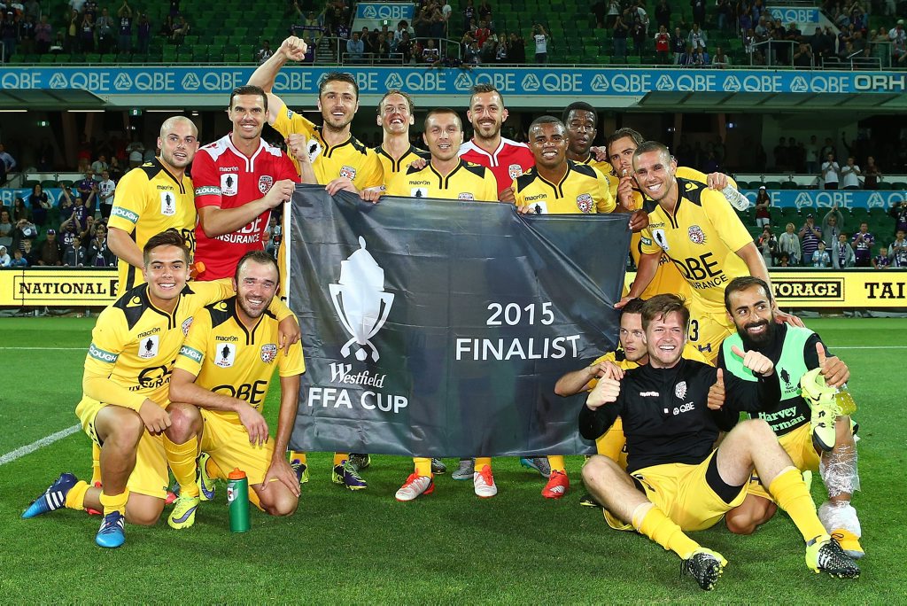 Glory players pose with the Glory players pose with the